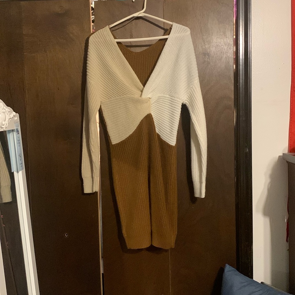 Selling a “Almost Famous” dress that is brown, white and light beige, Large.